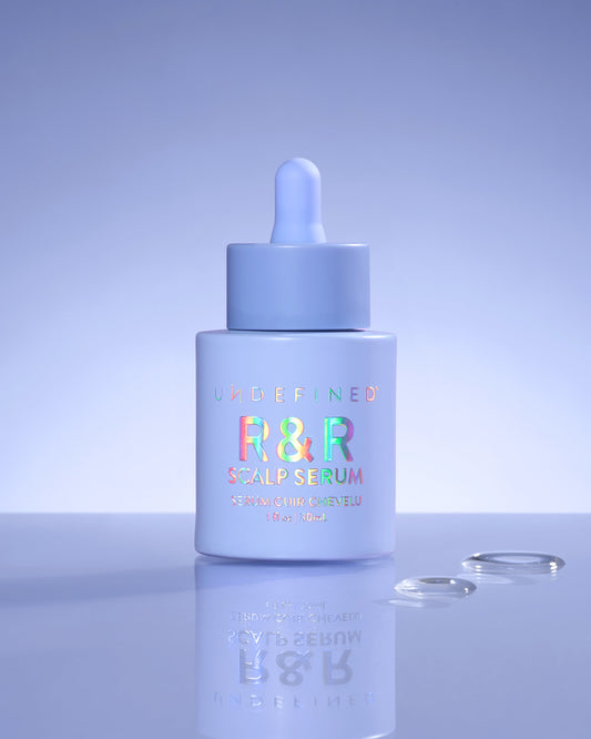 R&R Scalp Serum, blue dropper bottle on lilac background